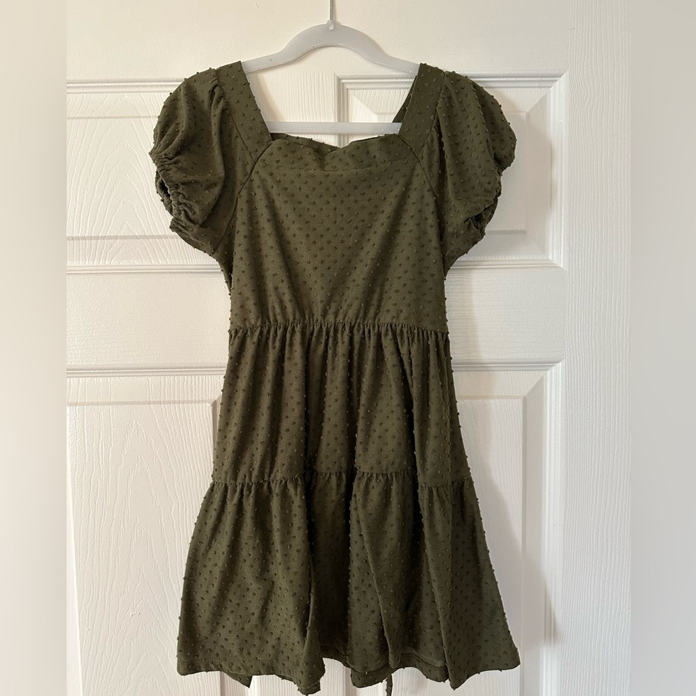 Girls dress. Swiss dots with a tie back. Size 8. Color- olive green.
